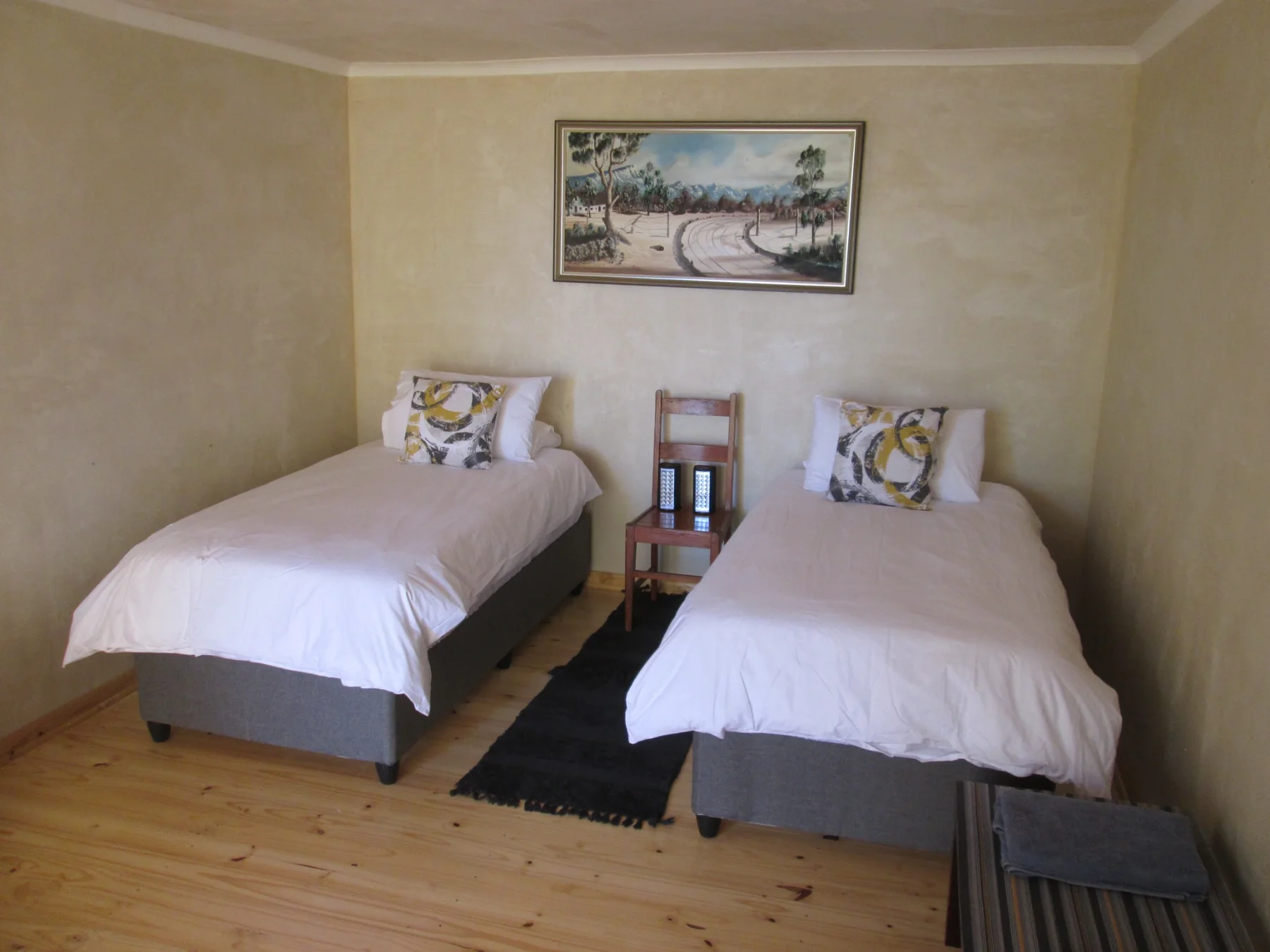 Nardouw cabin set up with two single beds